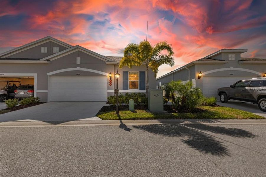 Front exterior of a new home in , Punta Gorda, FL, highlighting curb appeal (Image 1). Front exterior of a new home in , Punta Gorda, FL, highlighting curb appeal (Image 1).