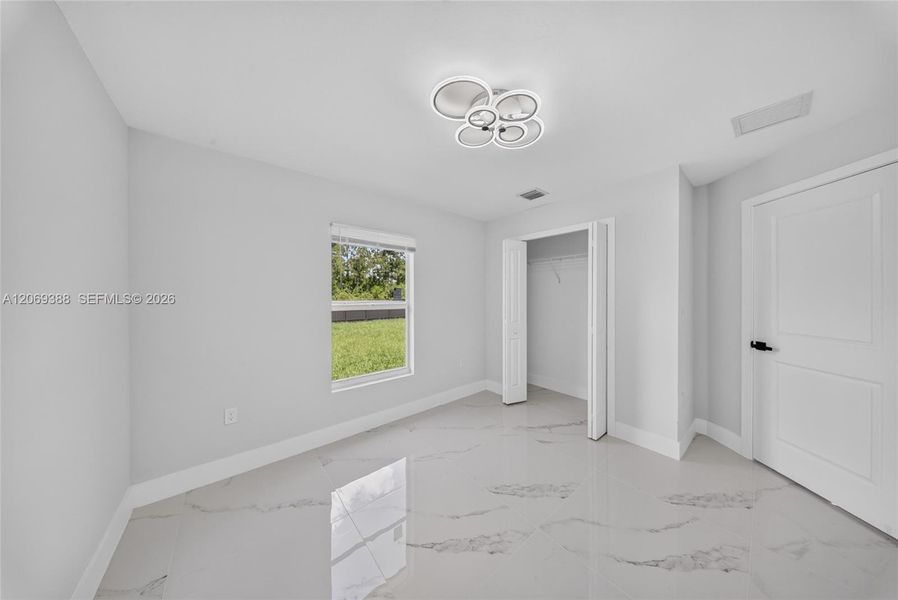 Spacious, unfurnished interior of a new home in , Lehigh Acres (Image 26).