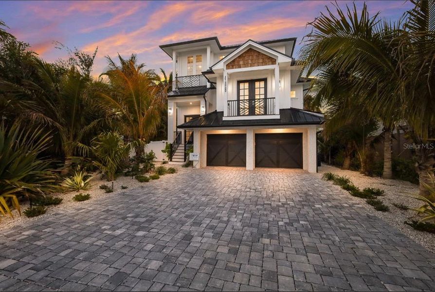 Front exterior of a new home in , Anna Maria, FL, highlighting curb appeal (Image 21). Front exterior of a new home in , Anna Maria, FL, highlighting curb appeal (Image 21).