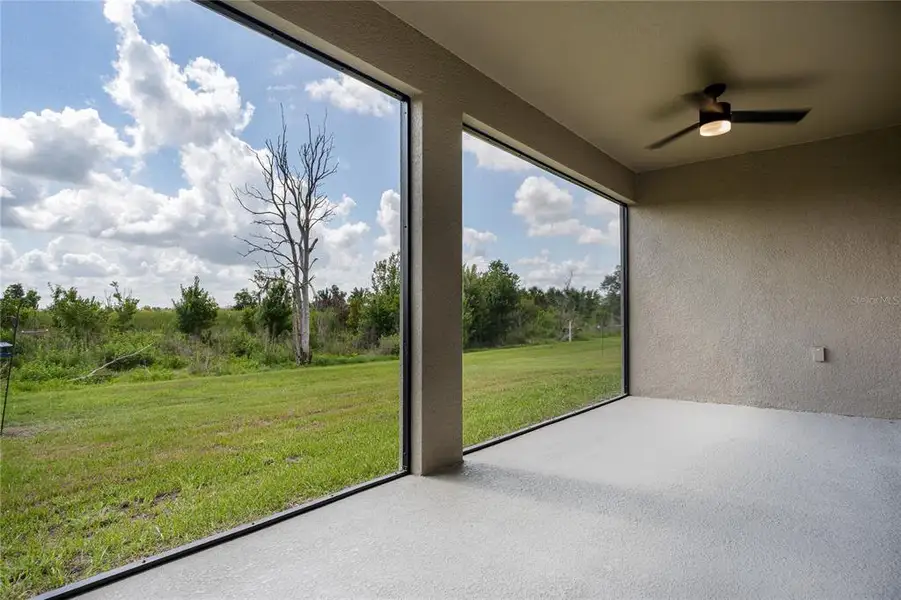 Exterior details and patio area of a home in Bella Lago, Parrish (Image 4). Exterior details and patio area of a home in Bella Lago, Parrish (Image 4).