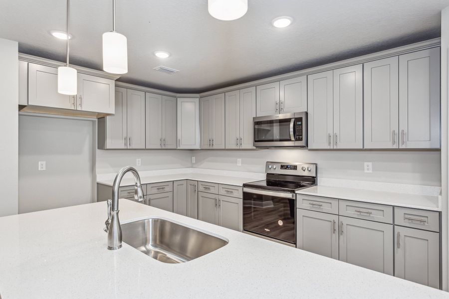 Representative furnished interior of a home built from the The Liberty by Herbst Homes in Clear Water Landing, Milton (Image 9).