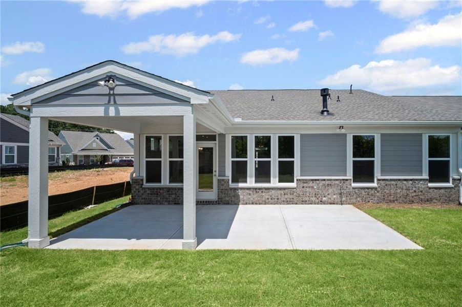 Front exterior of a new home in Laurel Farms, Dallas, GA, highlighting curb appeal (Image 25).