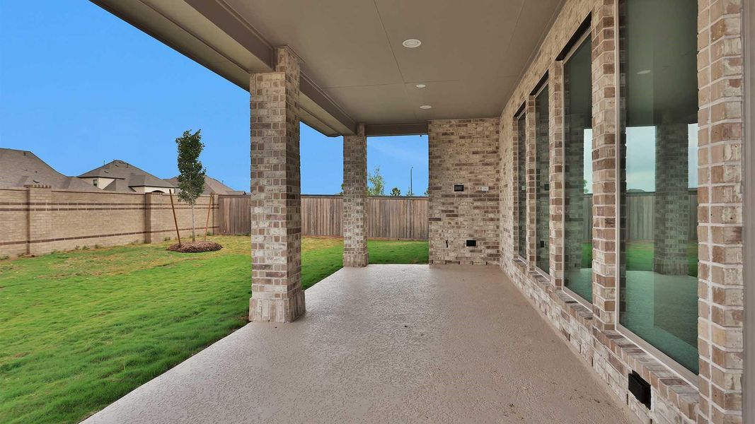 Exterior details and patio area of a home in Bridgeland, Cypress (Image 3).
