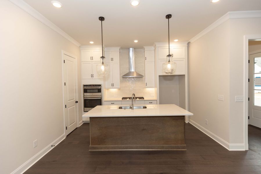 Representative furnished interior of a home built from the The Tensley by The Providence Group in Waterhaven, Cumming (Image 7).