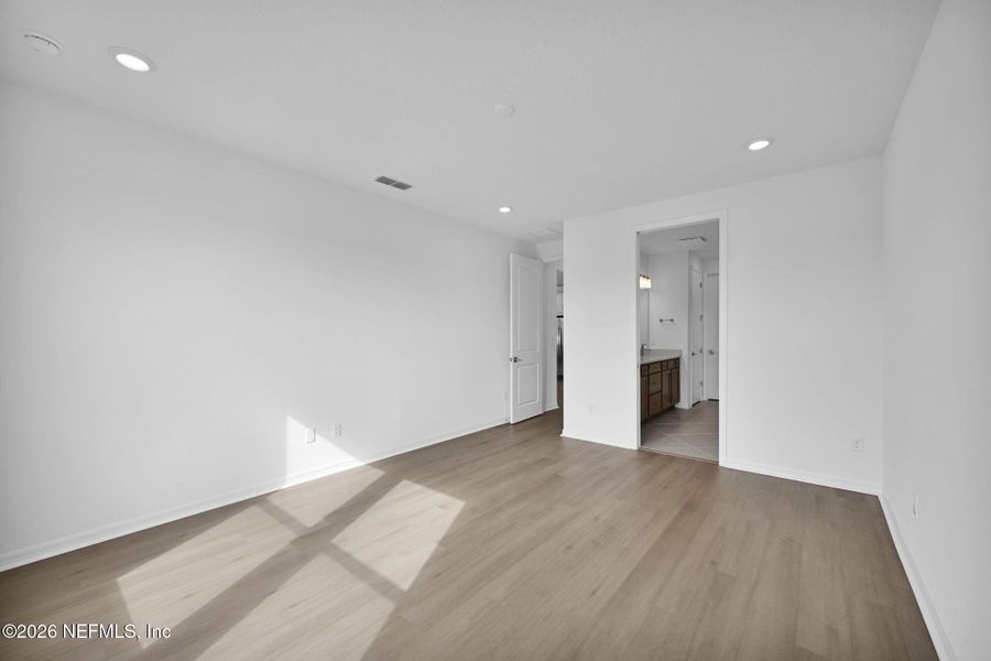 Spacious, unfurnished interior of a new home in Summer Bay at Grand Oaks, St. Augustine (Image 27).