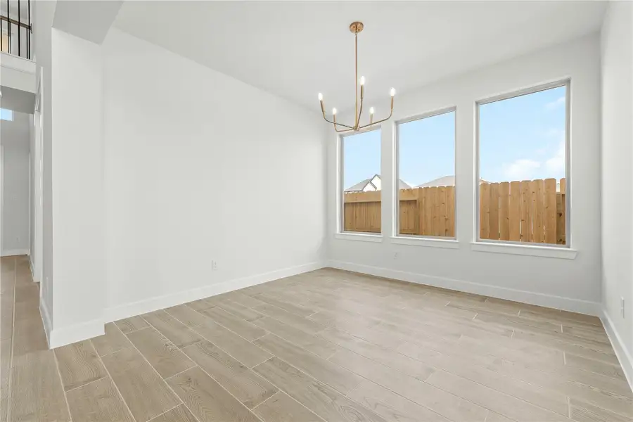 Spacious, unfurnished interior of a new home in Sunterra, Katy (Image 11). Spacious, unfurnished interior of a new home in Sunterra, Katy (Image 11).