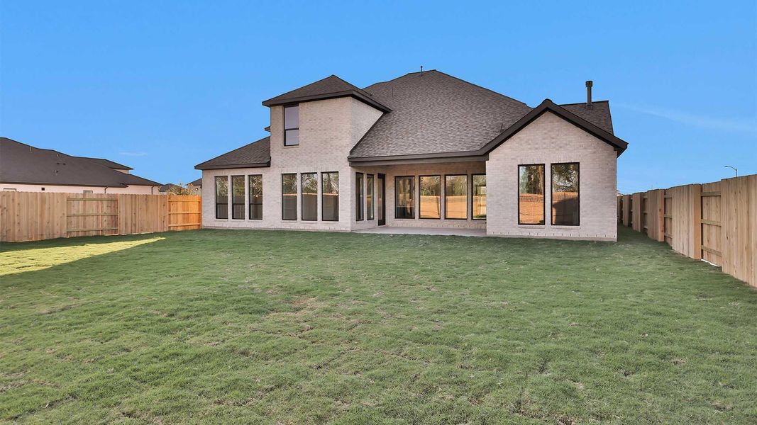 Exterior details and patio area of a home in Elyson 70', Katy (Image 4). Exterior details and patio area of a home in Elyson 70', Katy (Image 4).