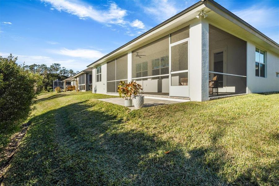 Exterior details and patio area of a home in Lake James, Lakeland (Image 24).