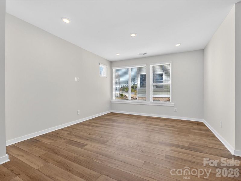 Spacious, unfurnished interior of a new home in Central Living at Craig, Charlotte (Image 20).