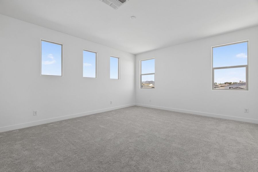 Spacious, unfurnished interior of a new home in The Grove at El Cidro, Goodyear (Image 30).
