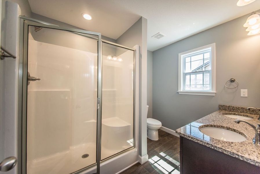 Representative furnished interior of a home built from the Jackson by Enchanted Homes in Ballentine Ridge, Lyman (Image 31).