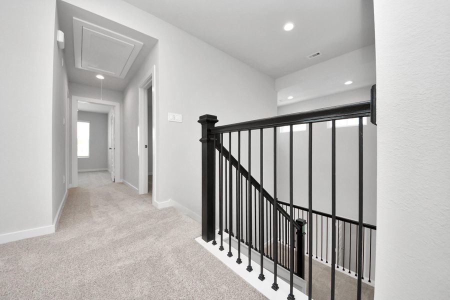 Ascend to relaxation in this fantastic game room! Ideal for both casual gatherings and adult gaming, it boasts plush carpet, lofty ceilings, custom paint, and ample windows for abundant natural light. Sample photo of completed home with similar floor plan. Actual colors and selections may vary. Ascend to relaxation in this fantastic game room! Ideal for both casual gatherings and adult gaming, it boasts plush carpet, lofty ceilings, custom paint, and ample windows for abundant natural light. Sample photo of completed home with similar floor plan. Actual colors and selections may vary.