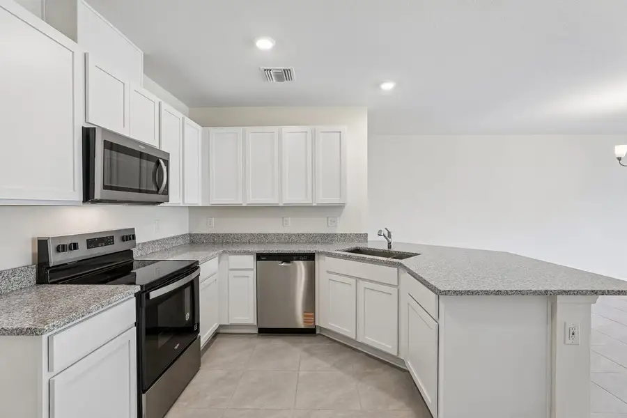 Furnished interior view inside a new home in Reserve at Forest Lake Townhomes, Lake Wales (Image 4).