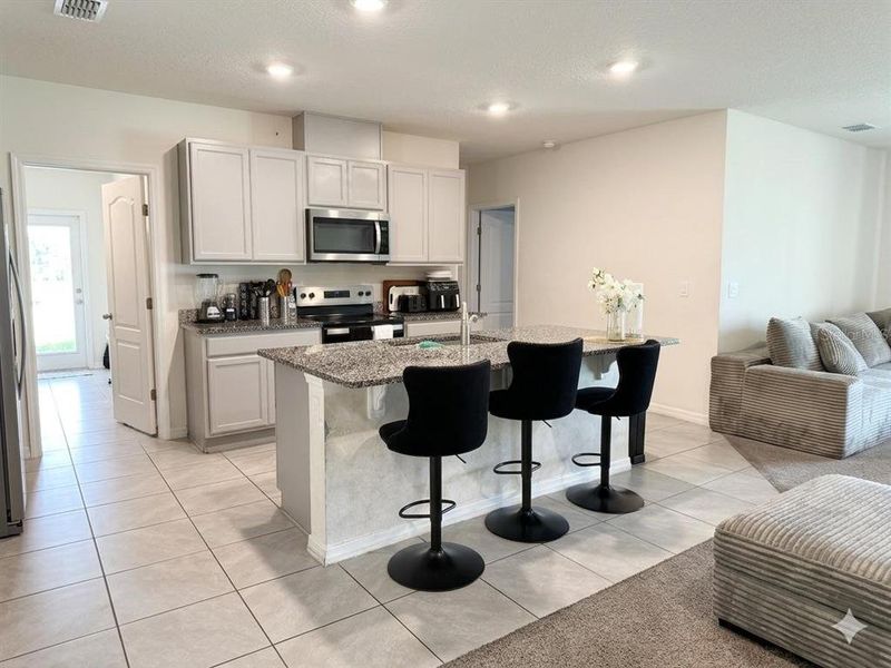 Furnished interior view inside a new home in , Kissimmee (Image 19).