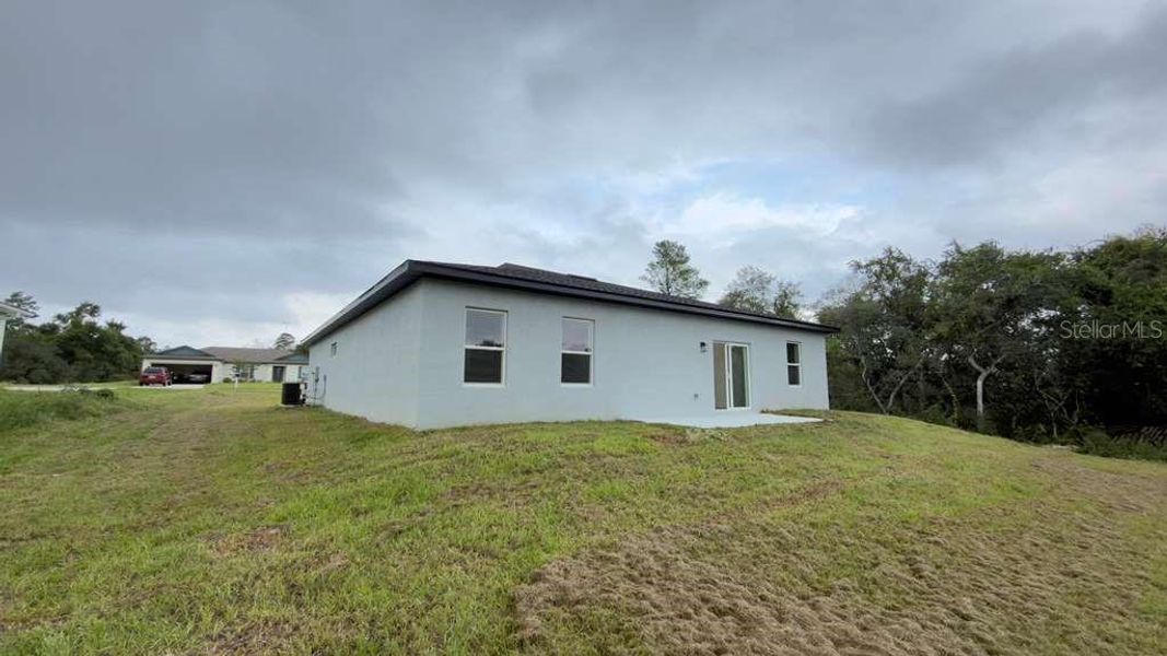 Exterior details and patio area of a home in , Ocala (Image 16).
