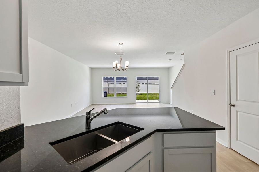 Furnished interior view inside a new home in Reserve at Forest Lake Townhomes, Lake Wales (Image 7).