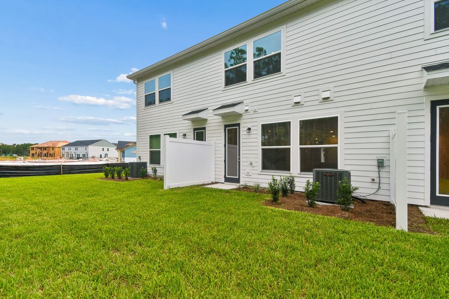 Exterior details and patio area of a home in Preserve at The Cays – The Harbor Series, Daytona Beach (Image 4).