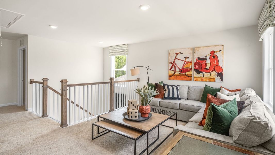 Representative furnished interior of a home built from the NORMAN by D.R. Horton in The Estates Park, Apex (Image 22).