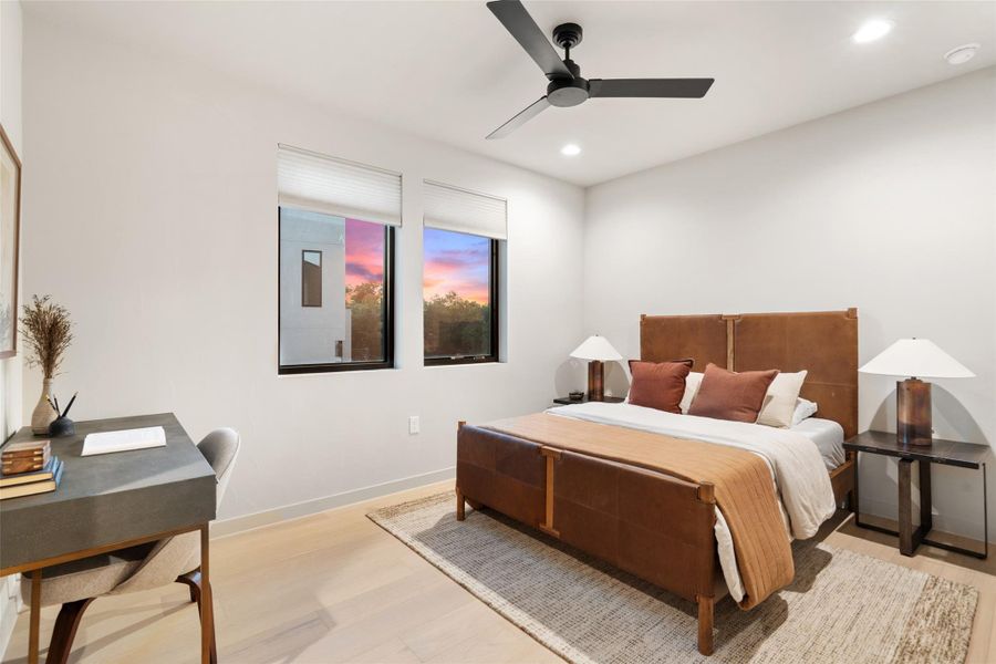 Minimalist design and abundant daylight define this airy bedroom retreat. Minimalist design and abundant daylight define this airy bedroom retreat.