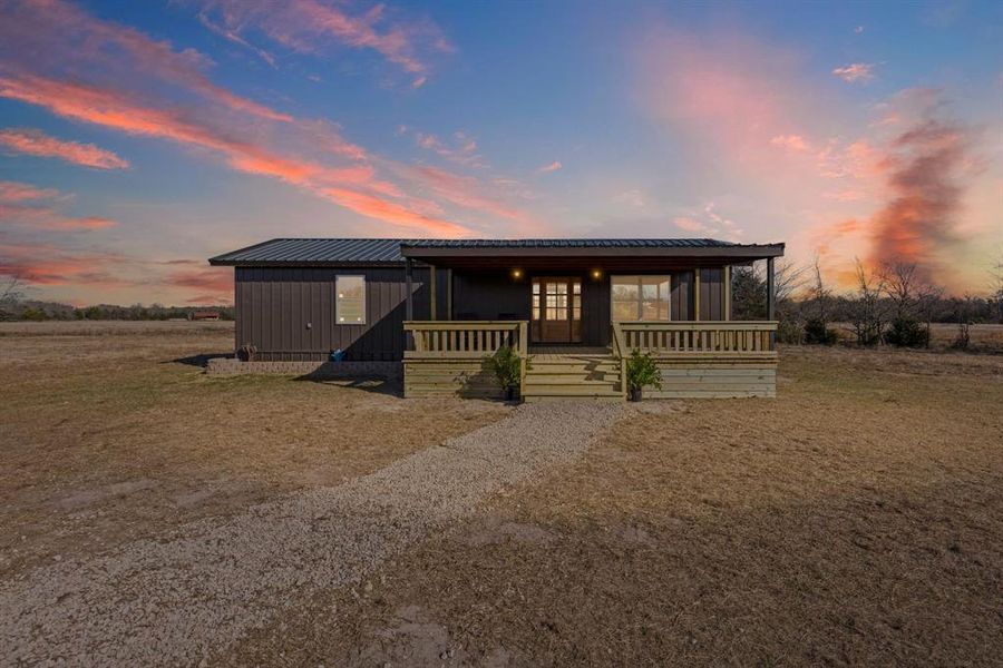 Exterior details and patio area of a home in , Point (Image 8).