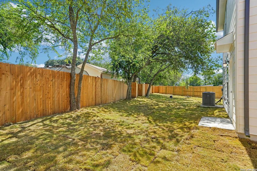 Exterior details and patio area of a home in Nagel Crossing, San Antonio (Image 18).