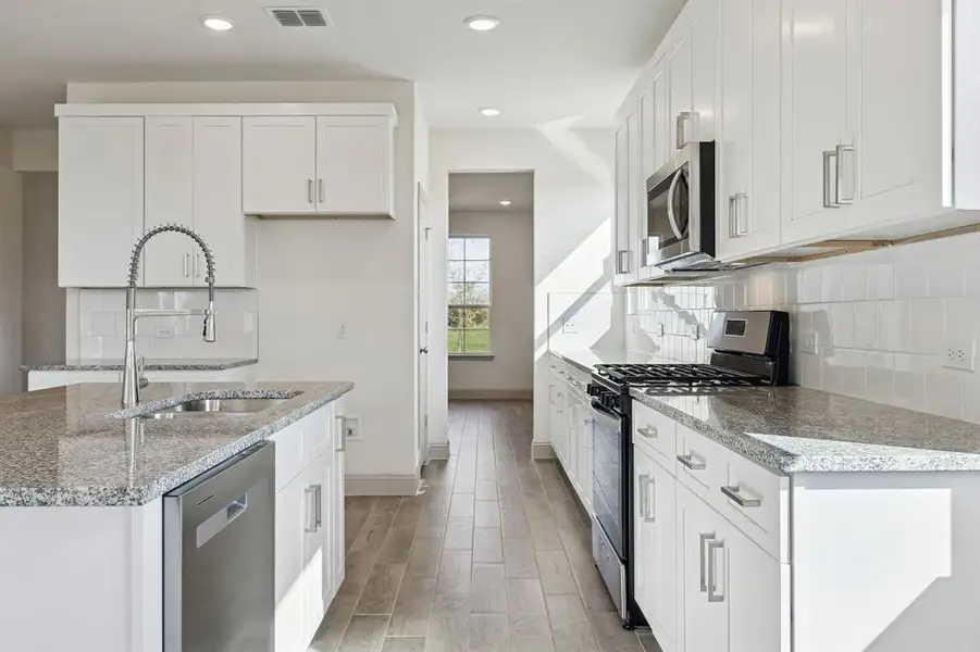 Furnished interior view inside a new home in Venetian, Weston (Image 6).