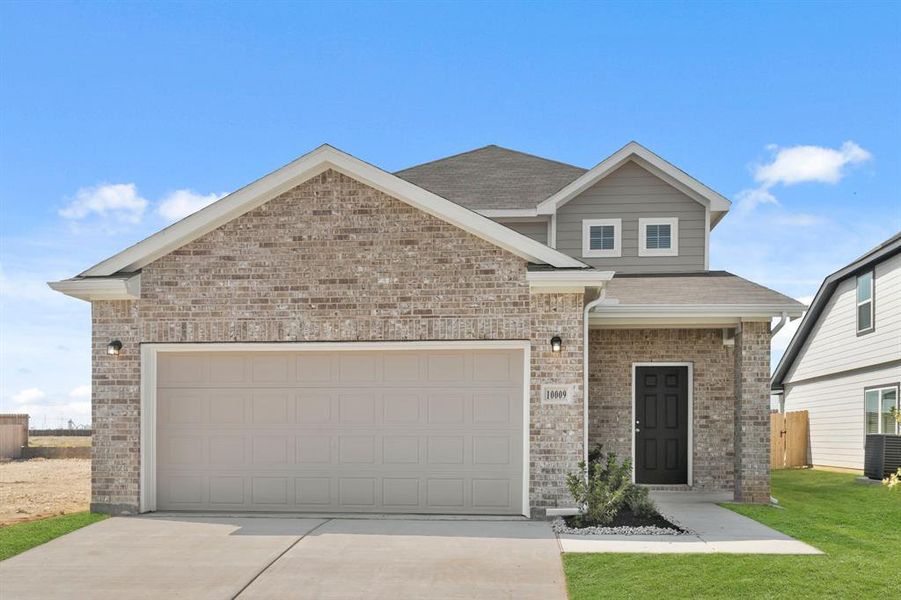 Front exterior of a new home in Retreat at Fossil Creek, Fort Worth, TX, highlighting curb appeal (Image 2). Front exterior of a new home in Retreat at Fossil Creek, Fort Worth, TX, highlighting curb appeal (Image 2).