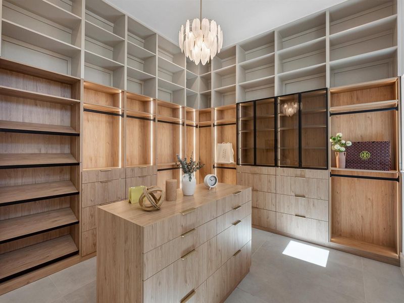 Oversized walk-in closets provide both style and functionality, with ample space for organization and everyday ease.