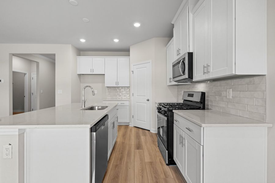 Furnished interior view inside a new home in Palmetto Place, Longs (Image 9).
