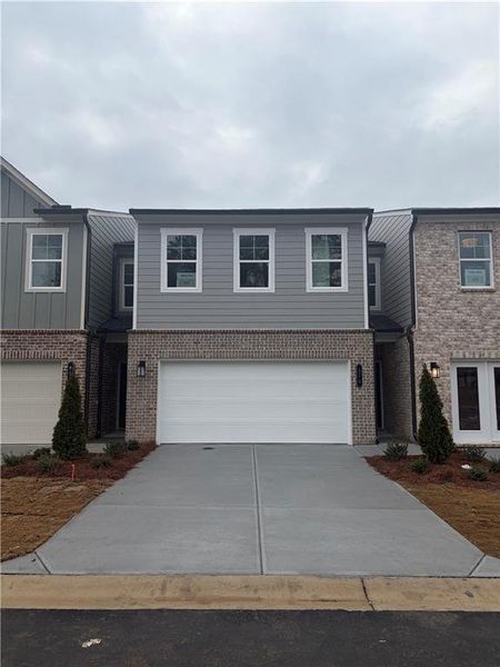 Front exterior of a new home in Darlington, Loganville, GA, highlighting curb appeal (Image 2). Front exterior of a new home in Darlington, Loganville, GA, highlighting curb appeal (Image 2).