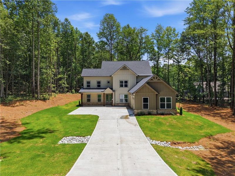 Front exterior of a new home in , Pendergrass, GA, highlighting curb appeal (Image 28). Front exterior of a new home in , Pendergrass, GA, highlighting curb appeal (Image 28).