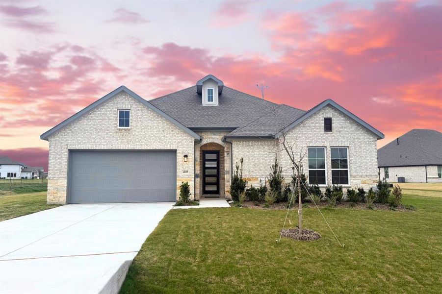 Front exterior of a new home in Ridge Park Estates, Royse City, TX, highlighting curb appeal (Image 2). Front exterior of a new home in Ridge Park Estates, Royse City, TX, highlighting curb appeal (Image 2).