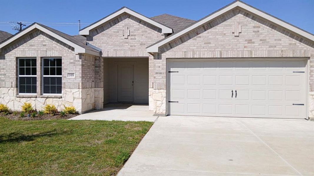 Front exterior of a new home in Labein Villas, Greenville, TX, highlighting curb appeal (Image 1). Front exterior of a new home in Labein Villas, Greenville, TX, highlighting curb appeal (Image 1).