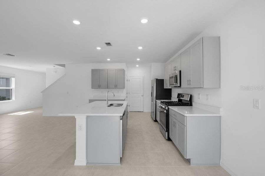 Furnished interior view inside a new home in Waterstone, Groveland (Image 18). Furnished interior view inside a new home in Waterstone, Groveland (Image 18).