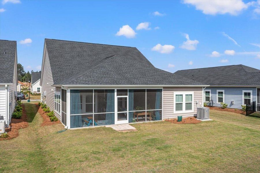 Exterior details and patio area of a home in Horizons at Summers Corner | 55+, Summerville (Image 27).