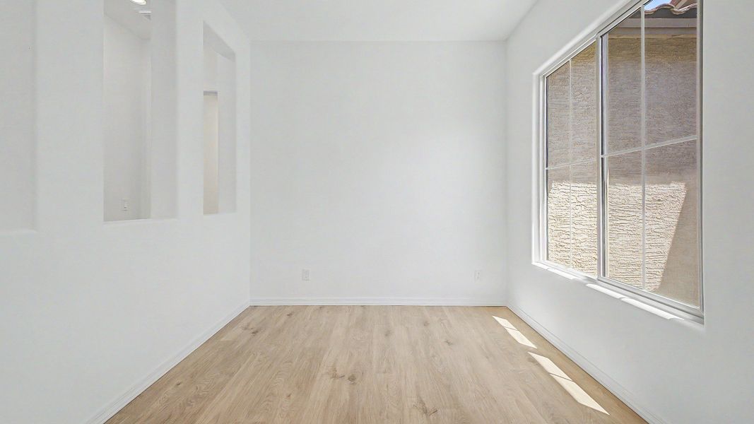 Furnished interior view inside a new home in Windrose, Waddell (Image 15).