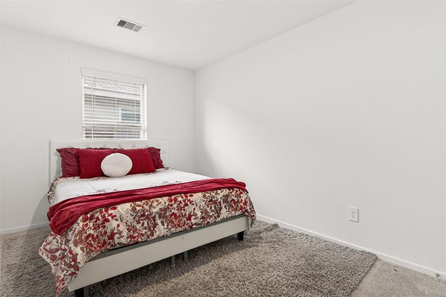 This is the 2nd bedroom used as a guest bedroom. This is the 2nd bedroom used as a guest bedroom.