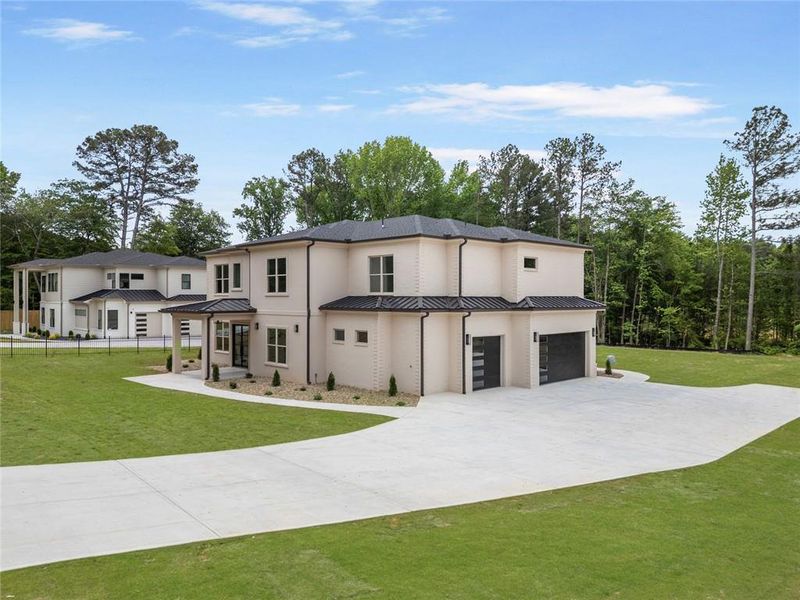 Front exterior of a new home in , Lawrenceville, GA, highlighting curb appeal (Image 26).