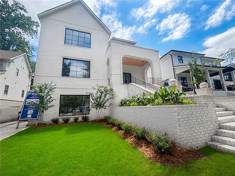 Front exterior of a new home in , Atlanta, GA, highlighting curb appeal (Image 15).