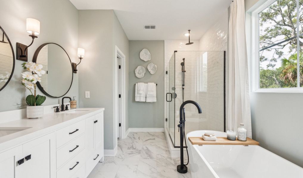 Primary bath with freestanding tub & frameless shower