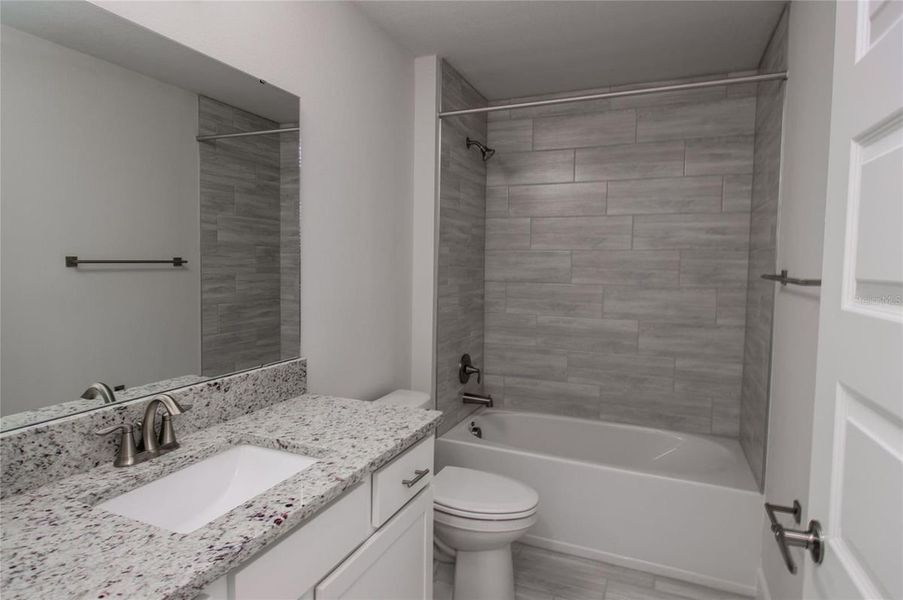 Representative furnished interior of a home built from the 1970 by Adams Homes in Winding Oaks, Weeki Wachee (Image 10).
