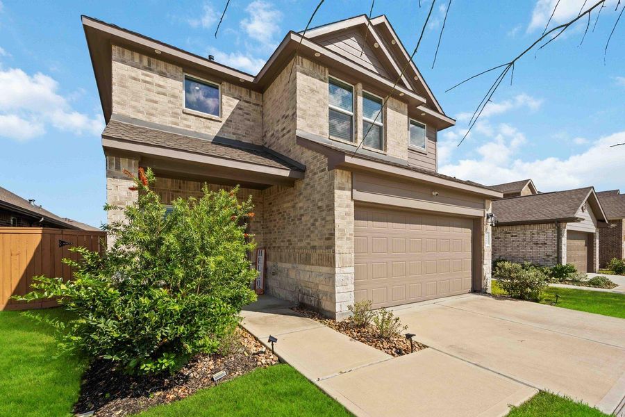 Charming 4 sided brick elevation with covered entry and great curb appeal Charming 4 sided brick elevation with covered entry and great curb appeal