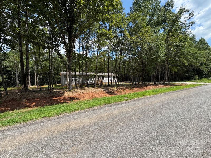 Front exterior of a new home in , Yadkinville, NC, highlighting curb appeal (Image 1).