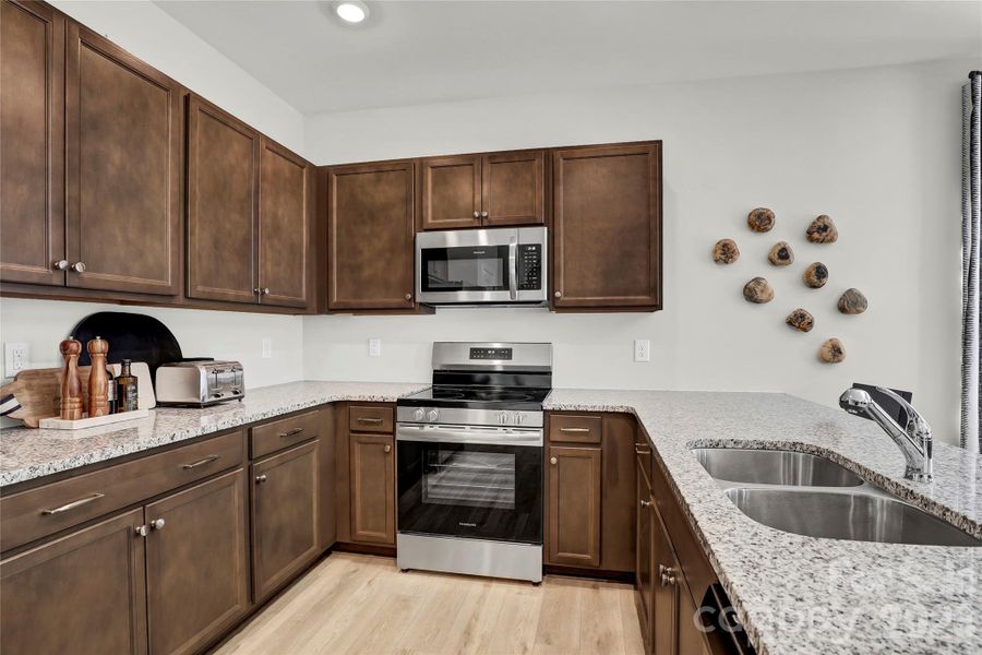 Furnished interior view inside a new home in Piper Creek, Newton (Image 12).