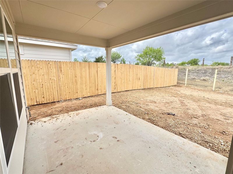 Exterior details and patio area of a home in Carillon, Manor (Image 3).