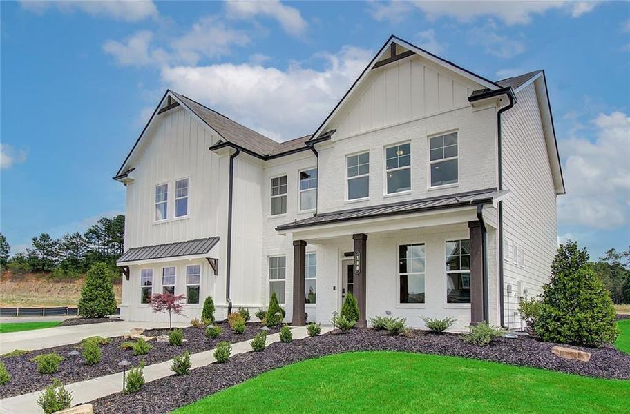 Front exterior of a new home in Summerlin, Winder, GA, highlighting curb appeal (Image 2). Front exterior of a new home in Summerlin, Winder, GA, highlighting curb appeal (Image 2).