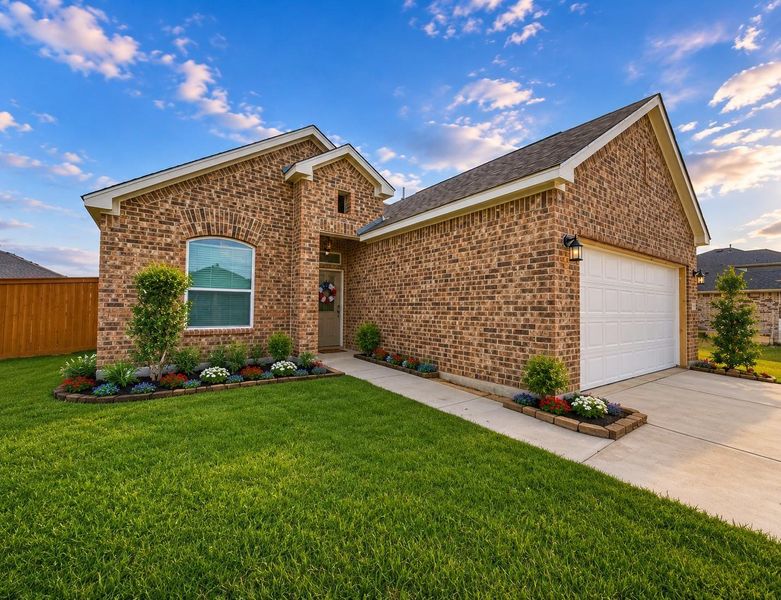 Front exterior of a new home in Cypress Green, Hockley, TX, highlighting curb appeal (Image 2). Front exterior of a new home in Cypress Green, Hockley, TX, highlighting curb appeal (Image 2).