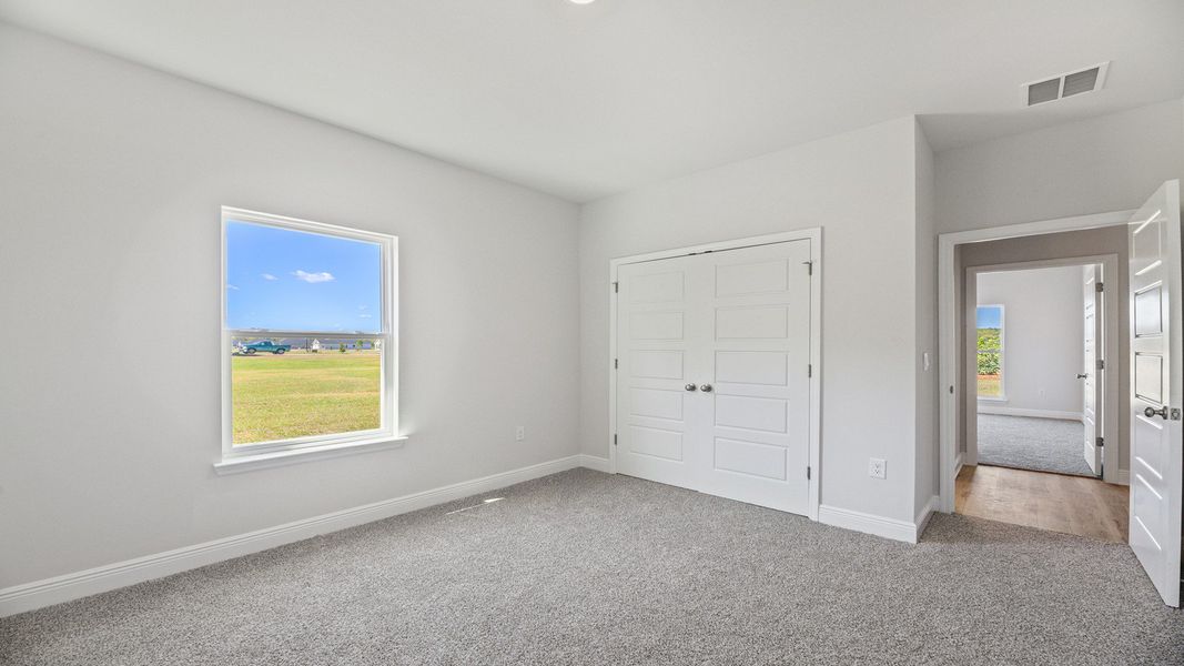 Representative unfurnished interior of a home built from the The Hawthorne by D.R. Horton in Meadows at Rehwinkel, Crawfordville (Image 12).