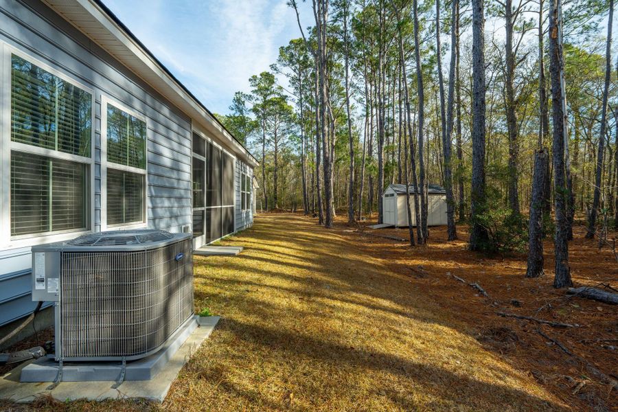 Exterior details and patio area of a home in Saint John's Lake: Arbor Collection, Johns Island (Image 29).