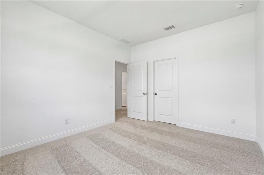 Spacious, unfurnished interior of a new home in Bennett Farm, Loganville (Image 40). Spacious, unfurnished interior of a new home in Bennett Farm, Loganville (Image 40).